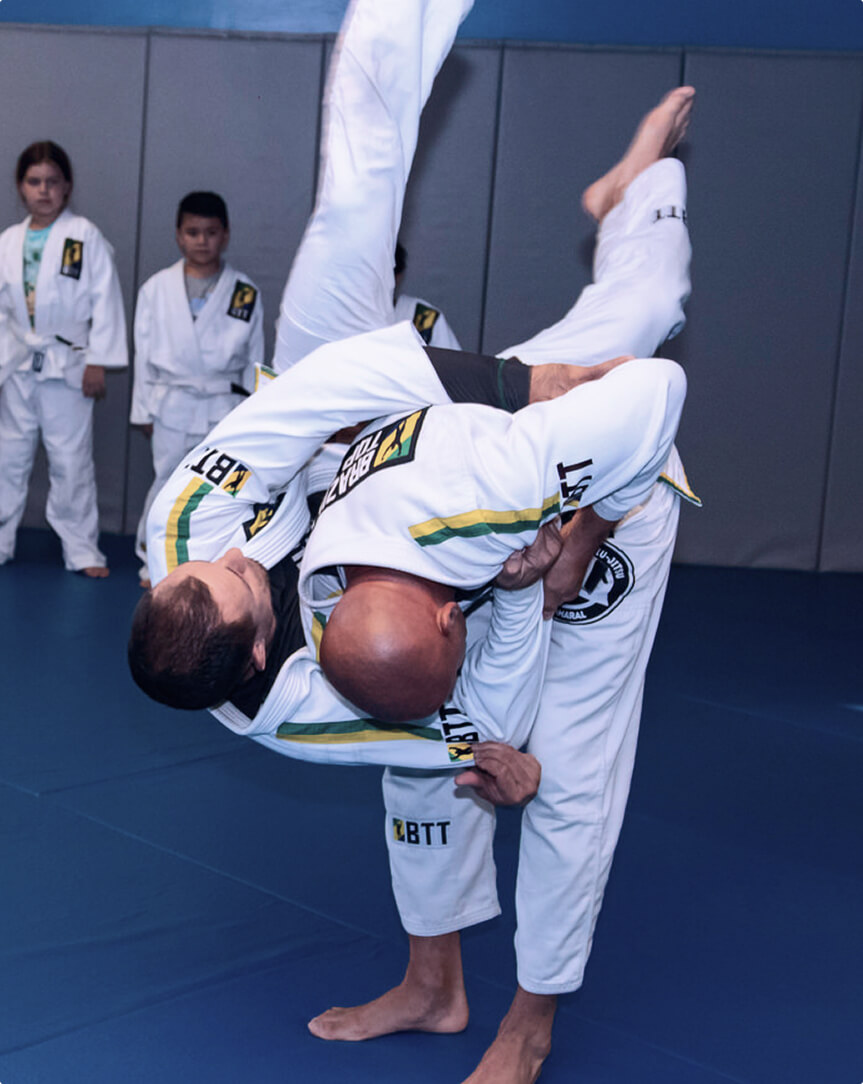 BTT Boca Raton instructor demonstrating a Jiu-Jitsu throw during class