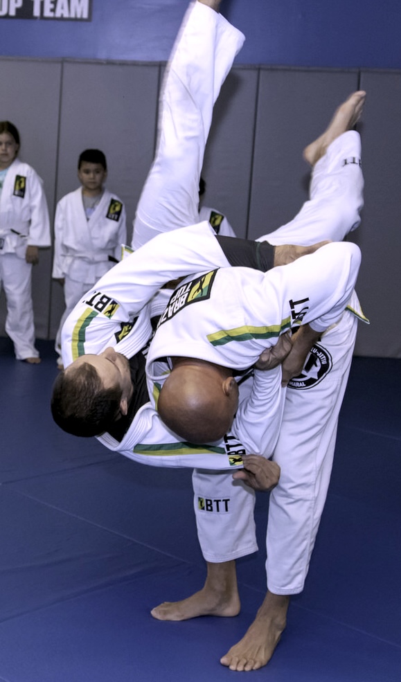 BTT Boca Raton instructor demonstrating a Jiu-Jitsu throw during class